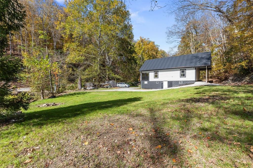 723 Glenfield Road Sewickley, PA 15143 - Photo 7 of 45 a view of house with a big yard
