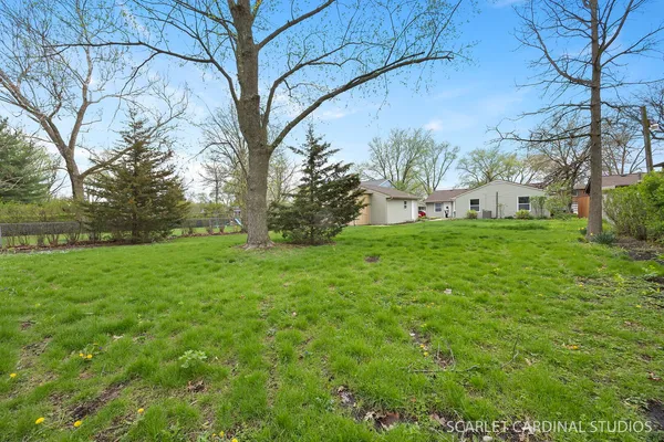 a view of a backyard with a garden