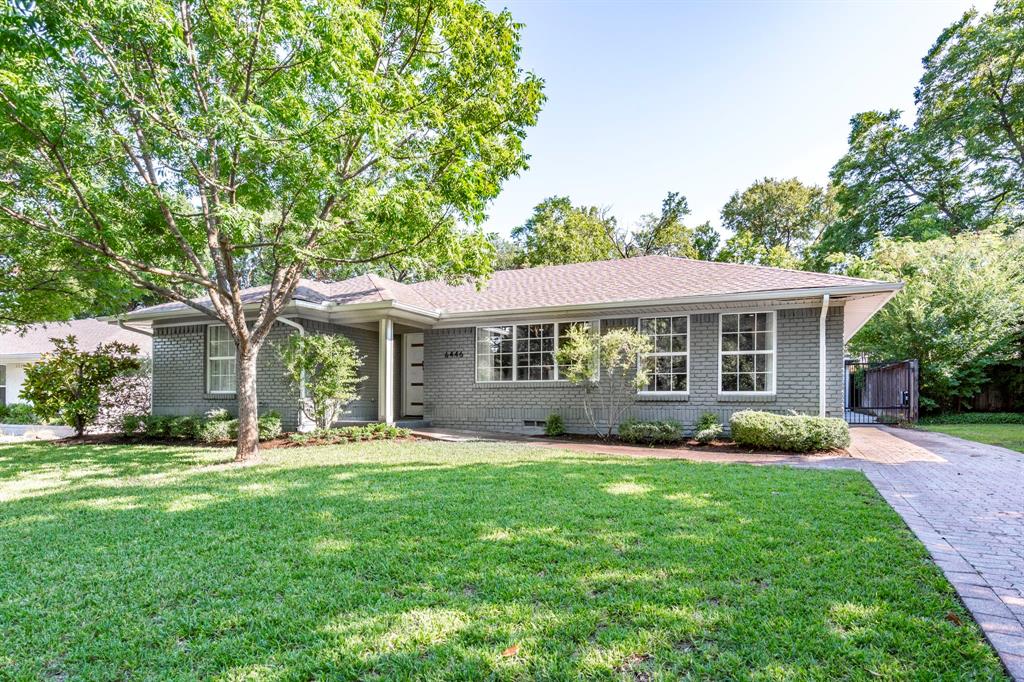 6446 Runnemede Lane Dallas, TX 75214 - Photo 1 of 23 a front view of a house with a garden and porch