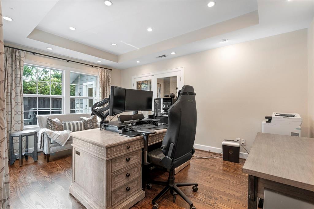 6446 Runnemede Lane Dallas, TX 75214 - Photo 17 of 23 a view of a workspace with furniture and a window