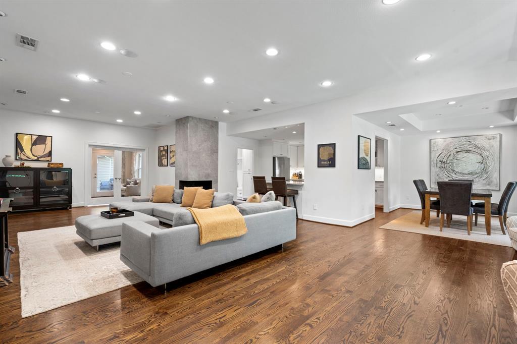 6446 Runnemede Lane Dallas, TX 75214 - Photo 3 of 23 a living room with furniture and wooden floor