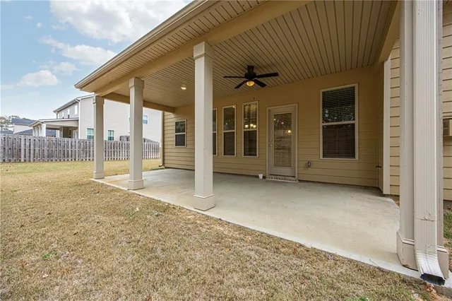 a view of an empty room with a sliding door