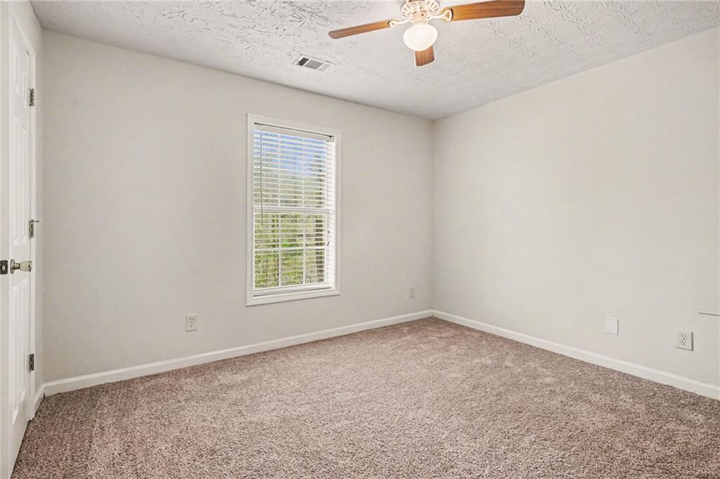 4083 Country Lane Gainesville, GA 30507 - Photo 11 of 18 an empty room with a window