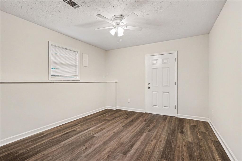 4083 Country Lane Gainesville, GA 30507 - Photo 12 of 18 wooden floor in an empty room