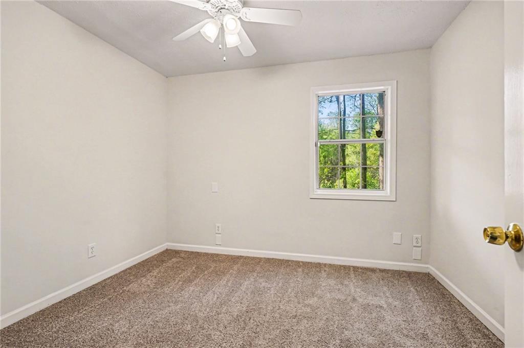 4083 Country Lane Gainesville, GA 30507 - Photo 13 of 18 an empty room with a window