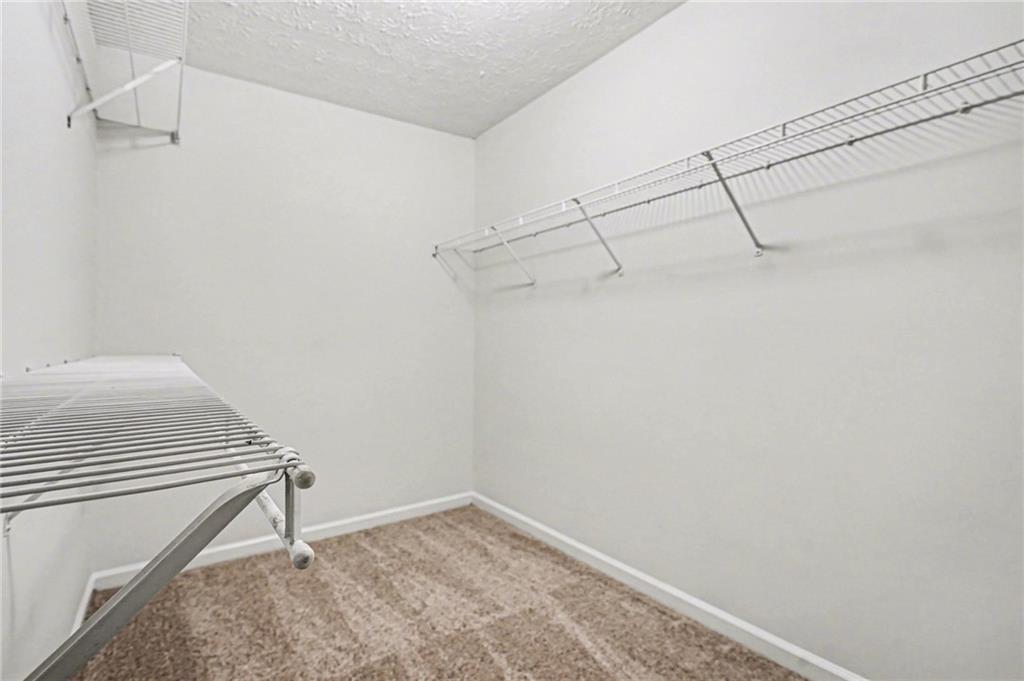 4083 Country Lane Gainesville, GA 30507 - Photo 16 of 18 a view of a room with racks on the wall