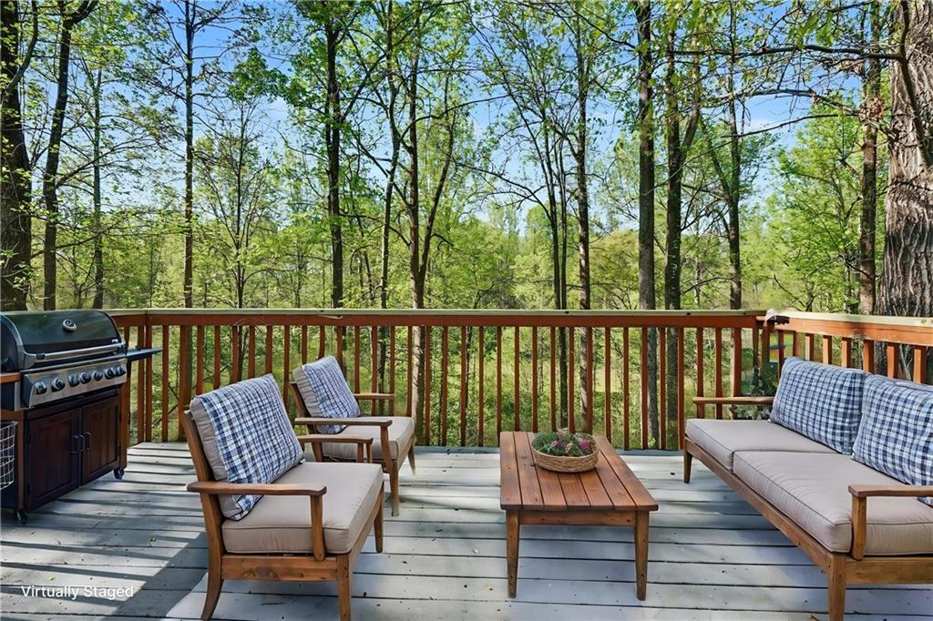 4083 Country Lane Gainesville, GA 30507 - Photo 5 of 18 a view of a chair and table on the deck