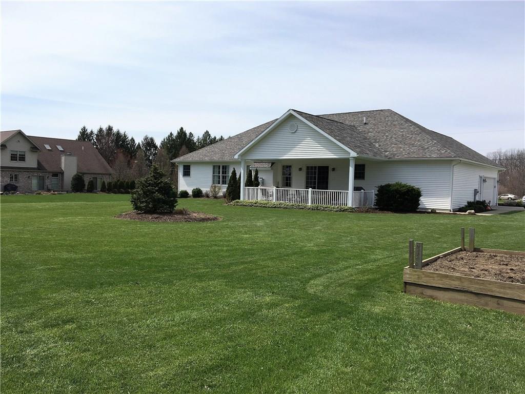 2051 Spangler Road Hermitage, PA 16148 - Photo 22 of 25 View From Rear Yard Showing View of Exterior Showing Covered Patio 14x24 feet