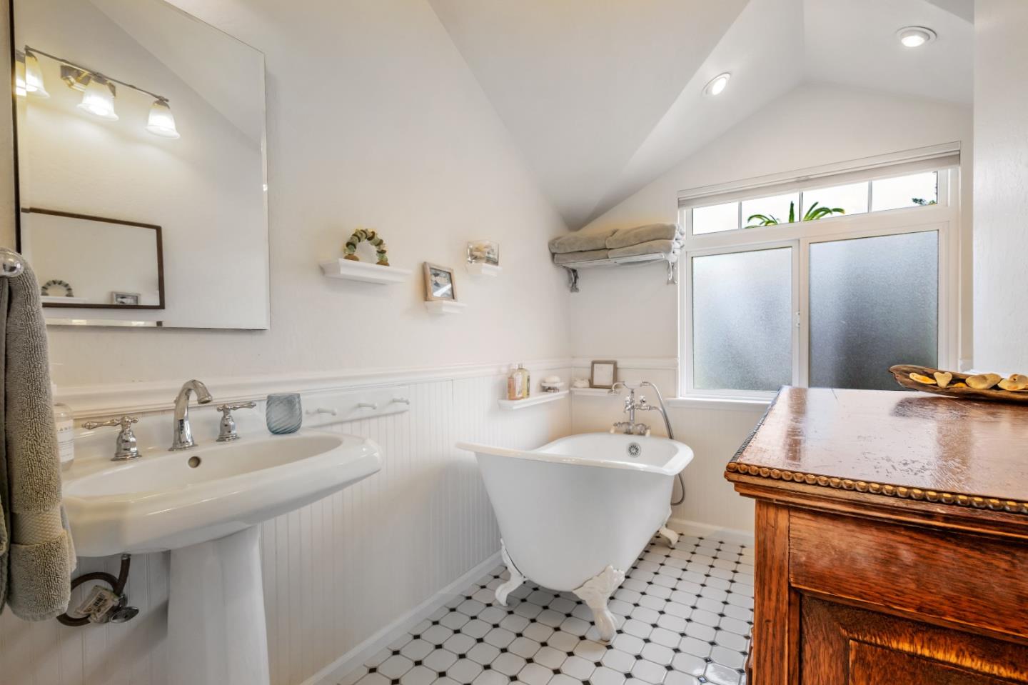 111 Farley Drive Aptos, CA 95003 - Photo 15 of 22 a bathroom with a sink toilet a mirror and shower