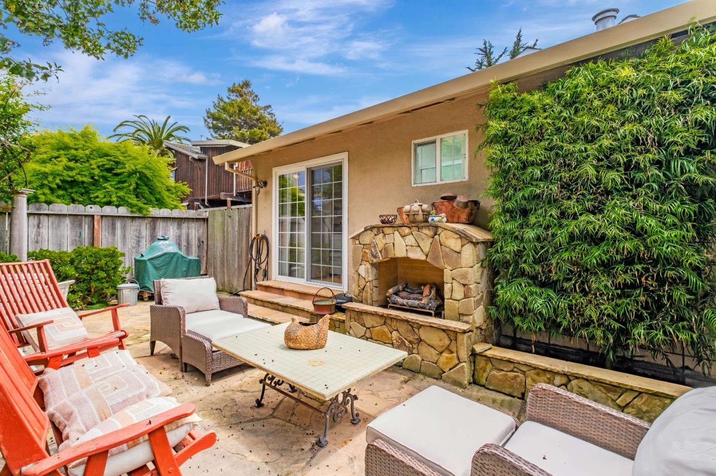 111 Farley Drive Aptos, CA 95003 - Photo 18 of 22 a view of a patio with couches table and chairs and potted plants