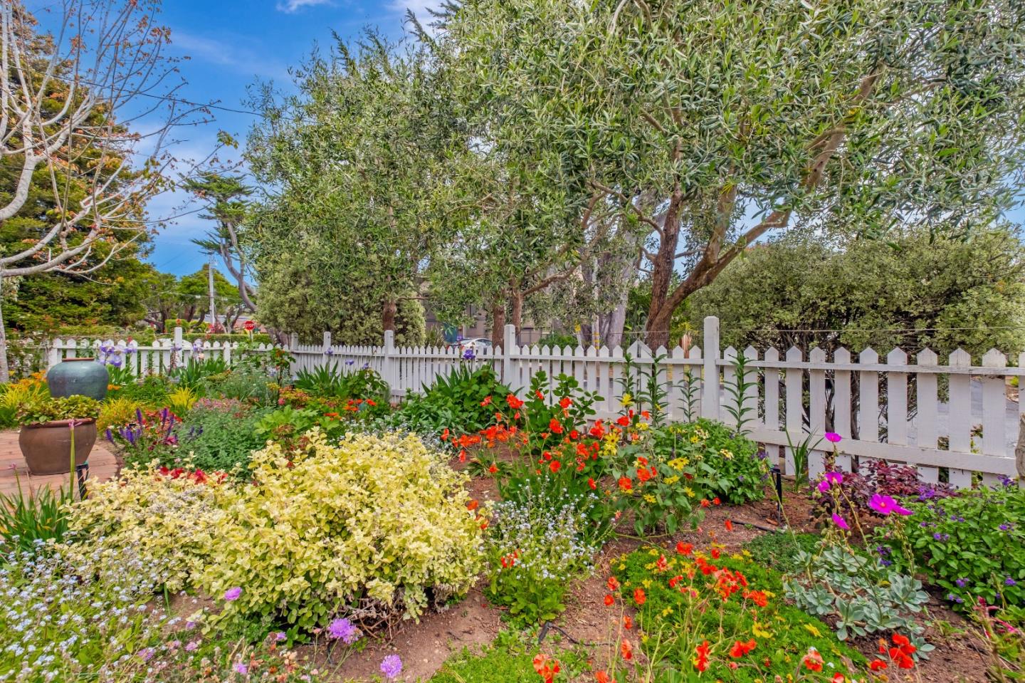 111 Farley Drive Aptos, CA 95003 - Photo 20 of 22 a garden with flowers and wooden fence