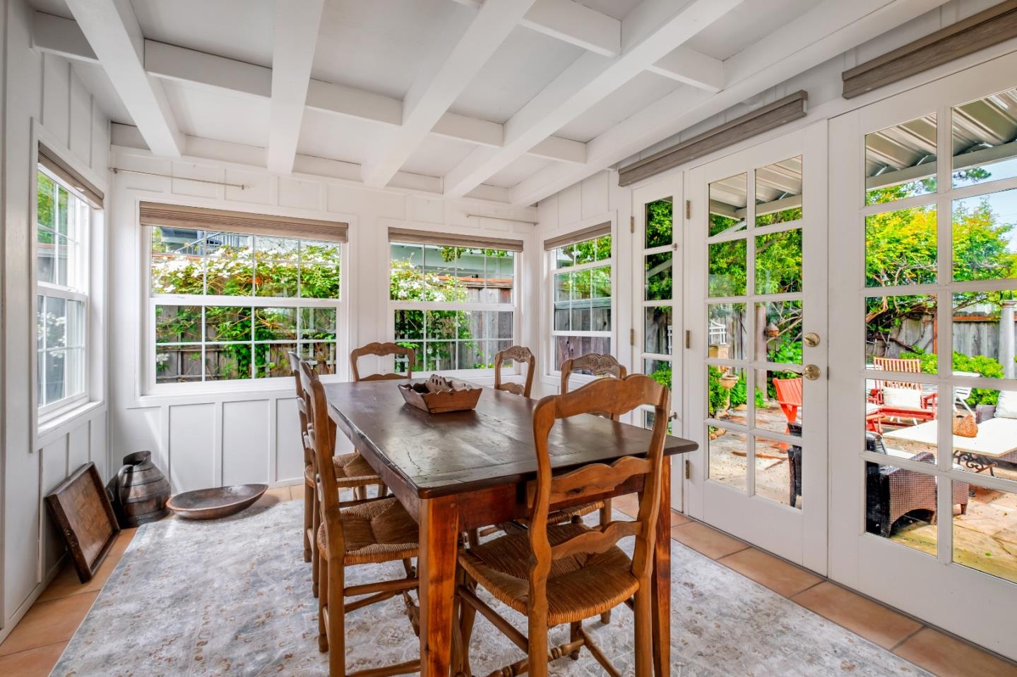 111 Farley Drive Aptos, CA 95003 - Photo 10 of 22 a view of a dining room with furniture large windows and wooden floor