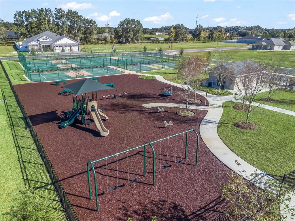 4 Northeast 125th Loop Oxford, FL 34484 - Photo 7 of 13 an aerial view of a house with outdoor space and lake view