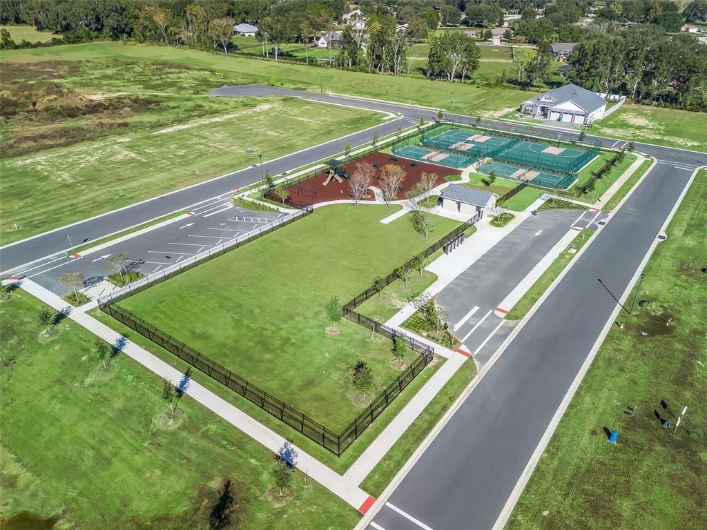 4 Northeast 125th Loop Oxford, FL 34484 - Photo 8 of 13 a view of a tennis court