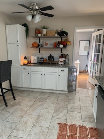 315 Sheridan Street Park Forest, IL 60466 - Photo 15 of 32 a kitchen with granite countertop a table and chairs in it