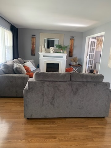 315 Sheridan Street Park Forest, IL 60466 - Photo 9 of 32 a living room with furniture and a fireplace