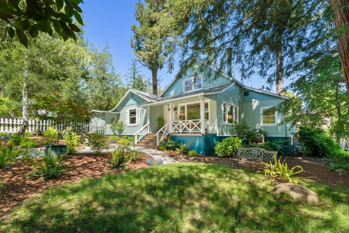 280 Main Street Ben Lomond, CA 95005 - Photo 3 of 47 a front view of a house with a yard and porch