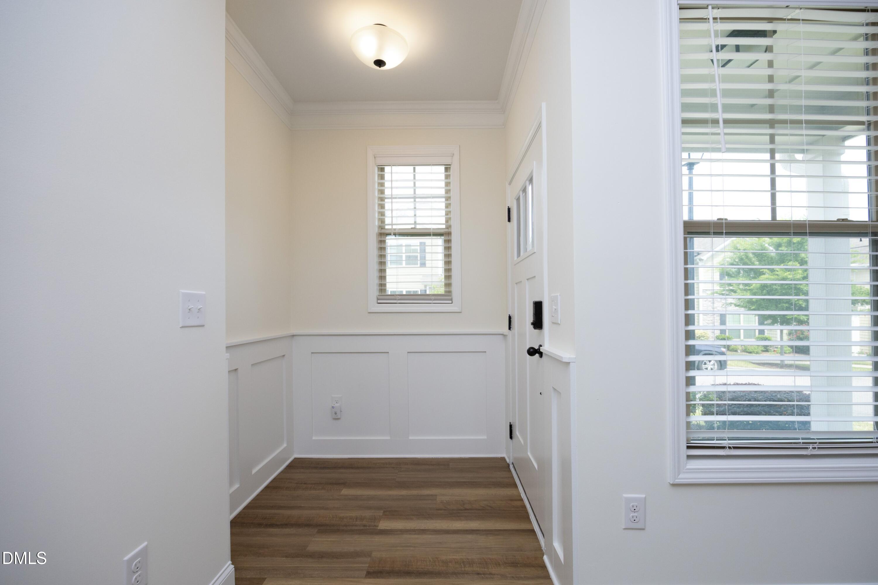 824 Country Downs Road Wake Forest, NC 27587 - Photo 10 of 41 a view of a hallway with a window