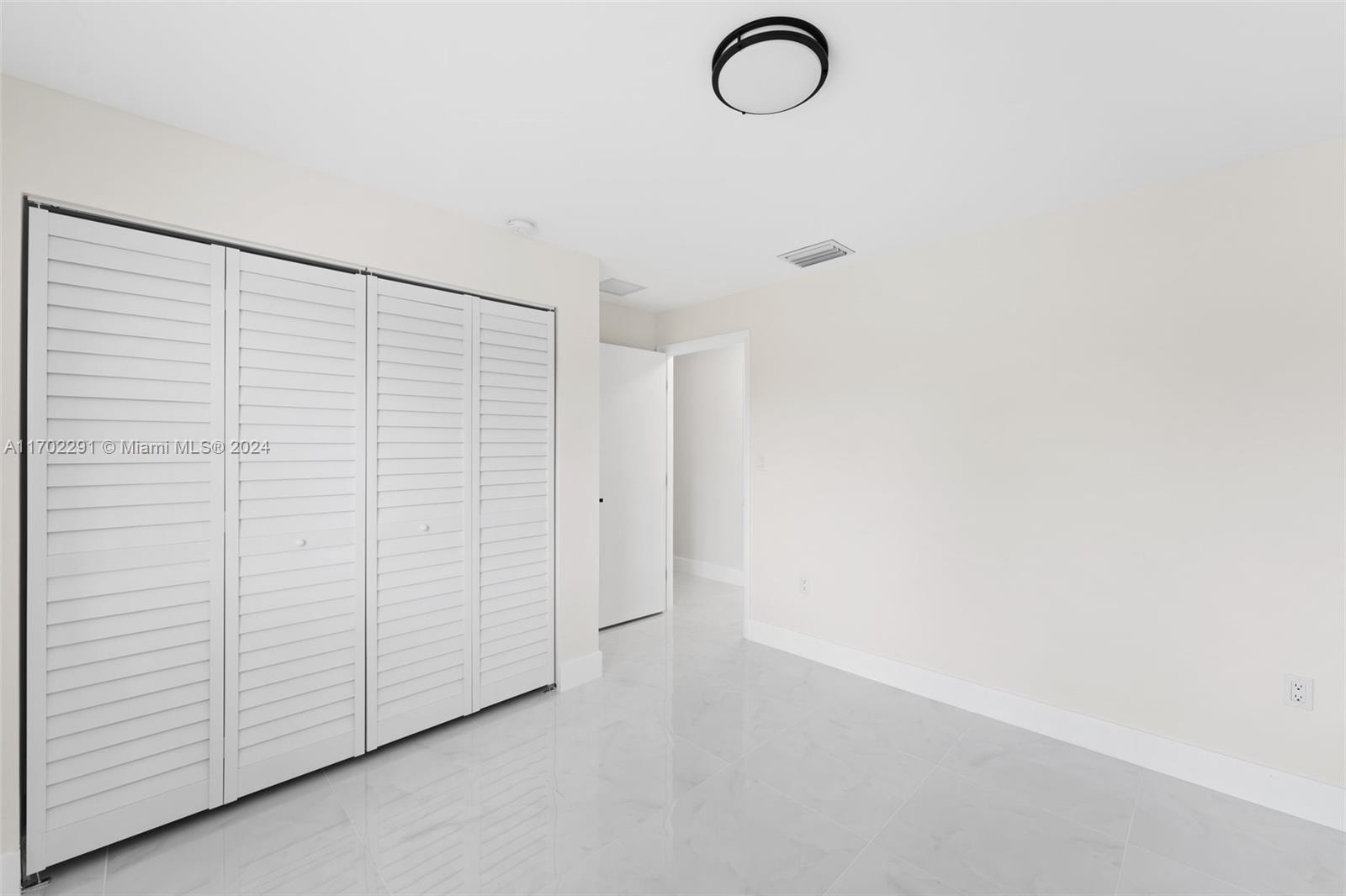 1999 Northwest 46th Street Miami, FL 33142 - Photo 11 of 22 a close view of a shower in a room