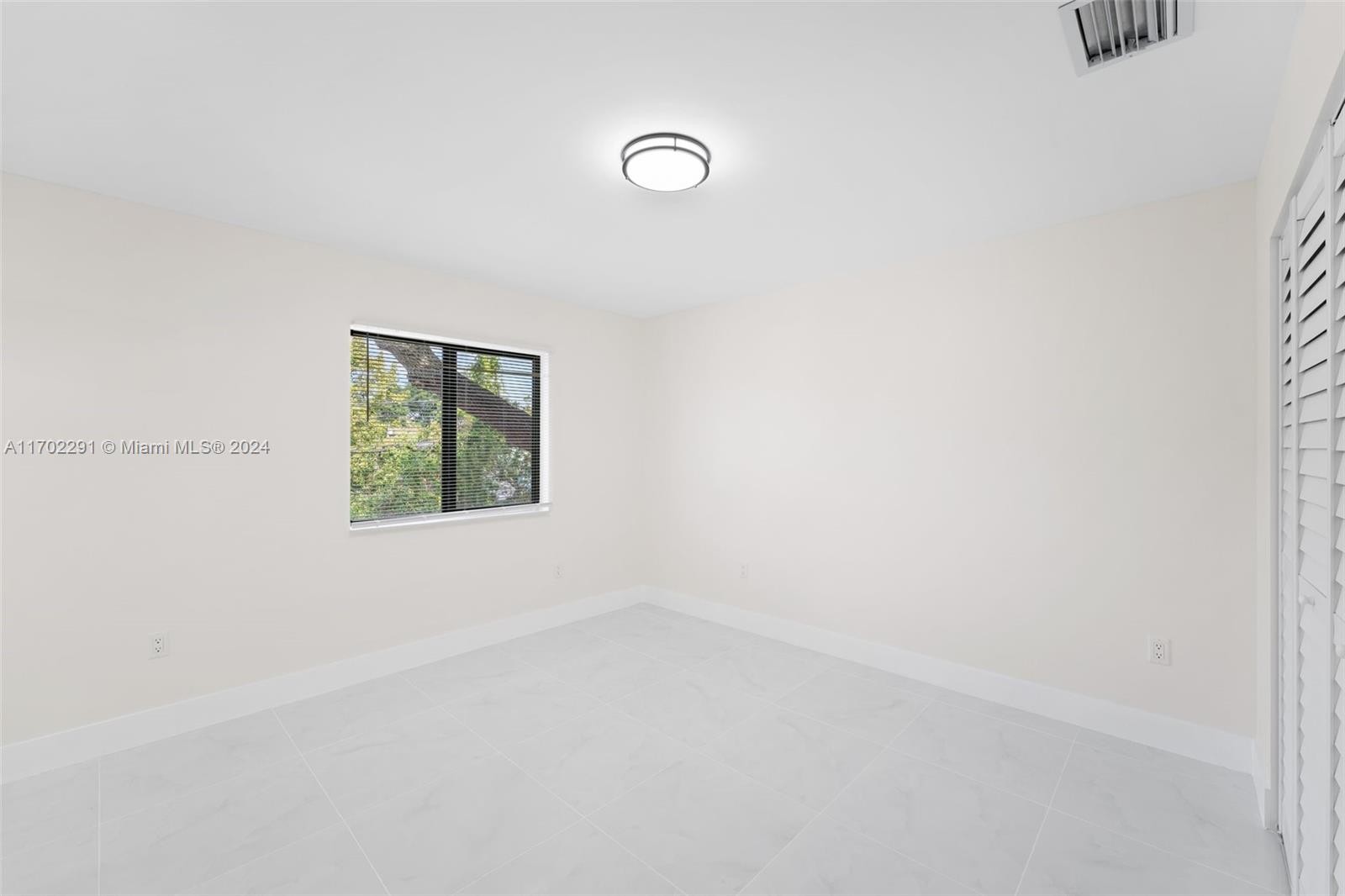 1999 Northwest 46th Street Miami, FL 33142 - Photo 20 of 22 a view of an empty room