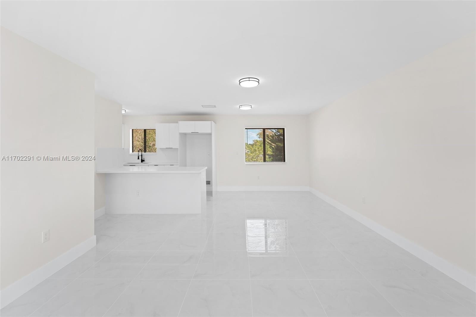 1999 Northwest 46th Street Miami, FL 33142 - Photo 5 of 22 a view of kitchen and window