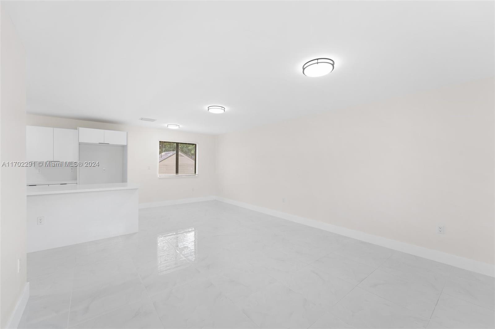 1999 Northwest 46th Street Miami, FL 33142 - Photo 6 of 22 a view of empty room