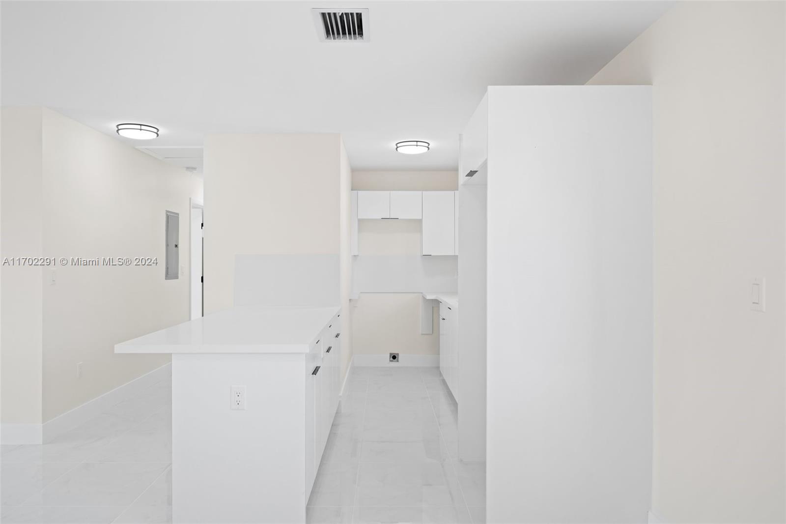 1999 Northwest 46th Street Miami, FL 33142 - Photo 8 of 22 a bathroom with a sink and a mirror