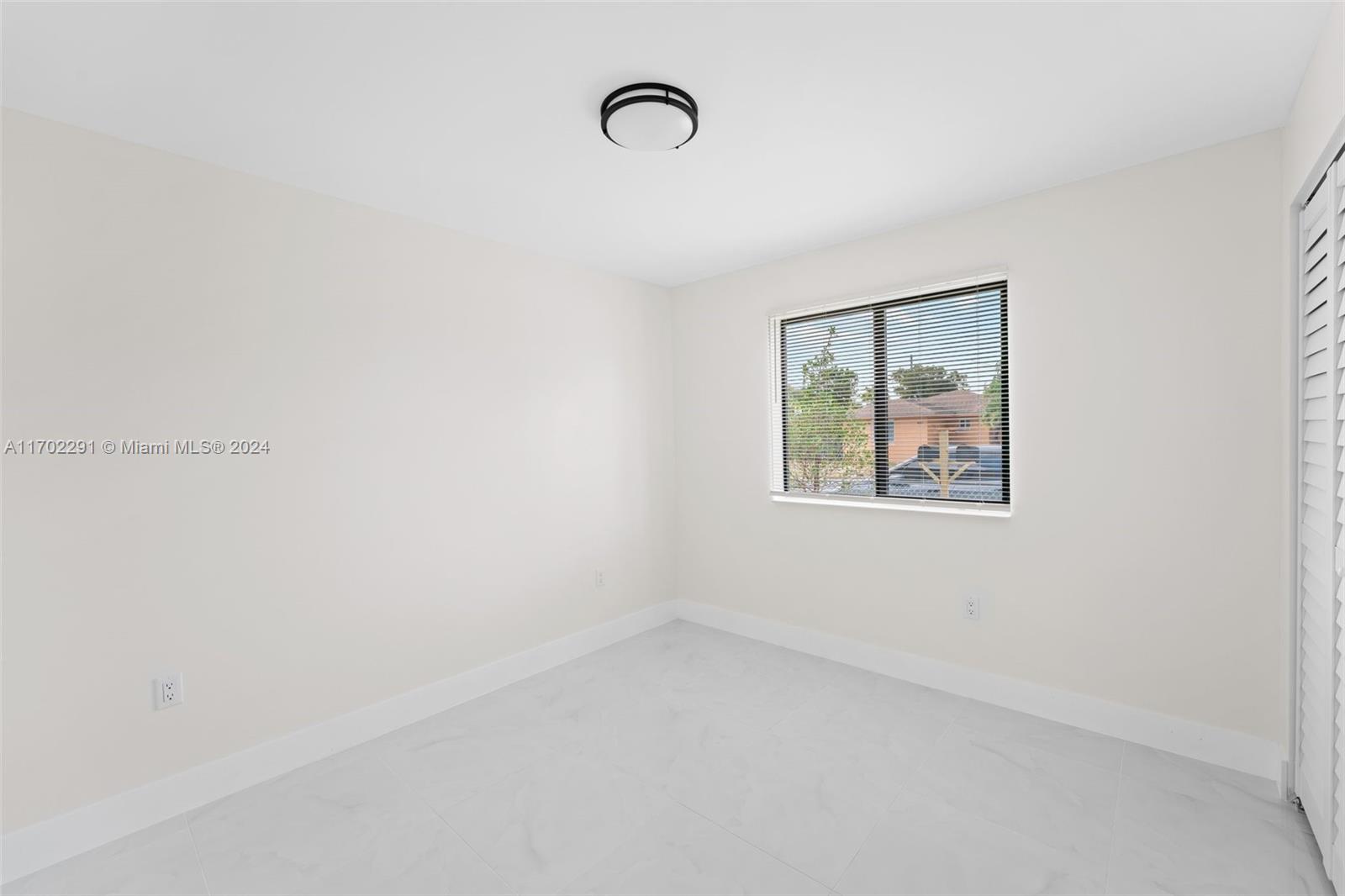 1999 Northwest 46th Street Miami, FL 33142 - Photo 10 of 22 a view of an empty room