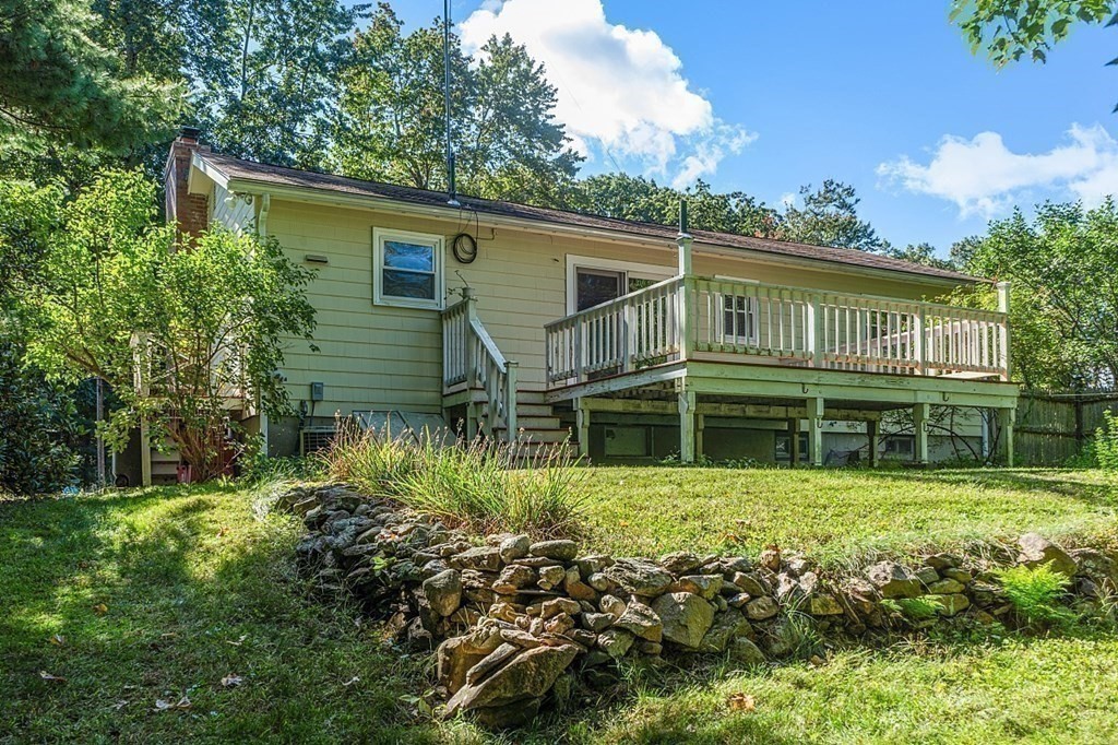11 Mc Intosh Road Chelmsford, MA 01824 - Photo 18 of 20 front view of a house with a yard