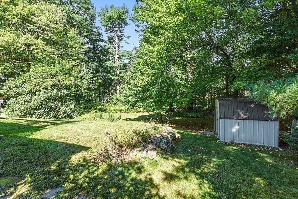 11 Mc Intosh Road Chelmsford, MA 01824 - Photo 19 of 20 a view of a backyard
