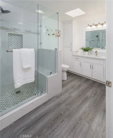 a bathroom with a sink and mirror