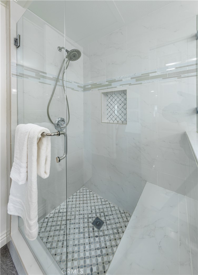 13280 St Andrews Drive, Unit 256A Seal Beach, CA 90740 - Photo 14 of 21 a bathroom with a shower