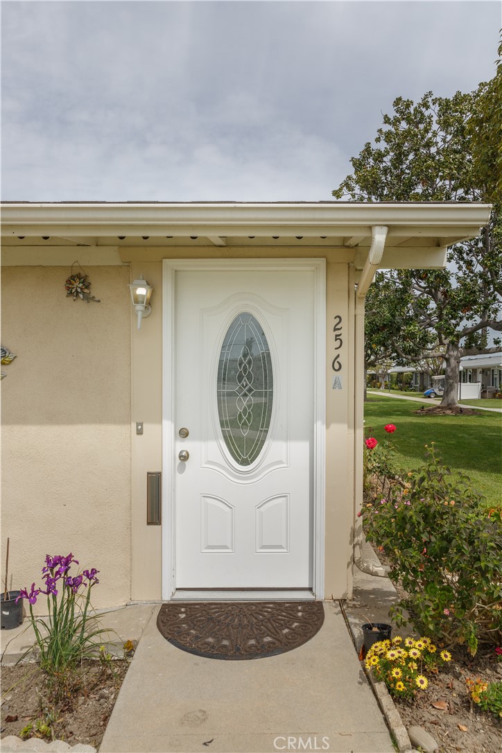 13280 St Andrews Drive, Unit 256A Seal Beach, CA 90740 - Photo 18 of 21 a bathroom with a sink and a mirror