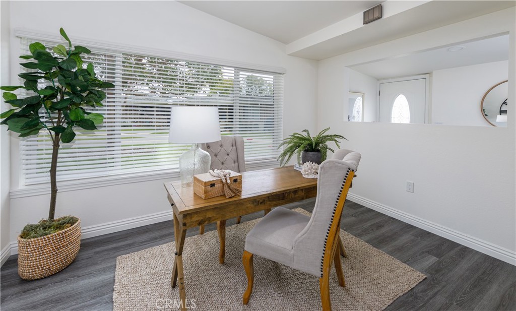 13280 St Andrews Drive, Unit 256A Seal Beach, CA 90740 - Photo 7 of 21 a view of a livingroom with furniture and a potted plant