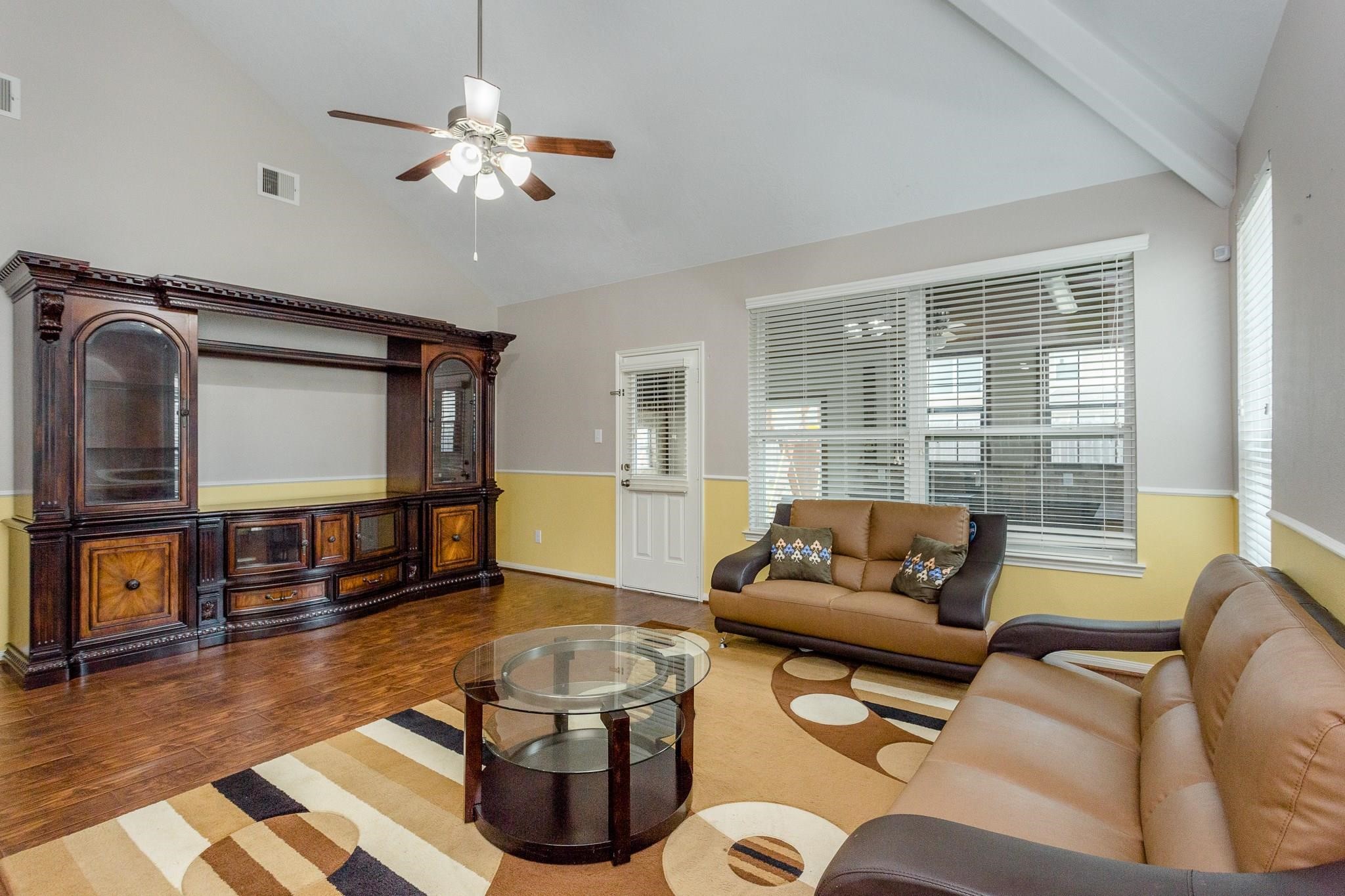 3430 Lilac Ranch Drive Katy, TX 77494 - Photo 6 of 29 a living room with furniture and a large window