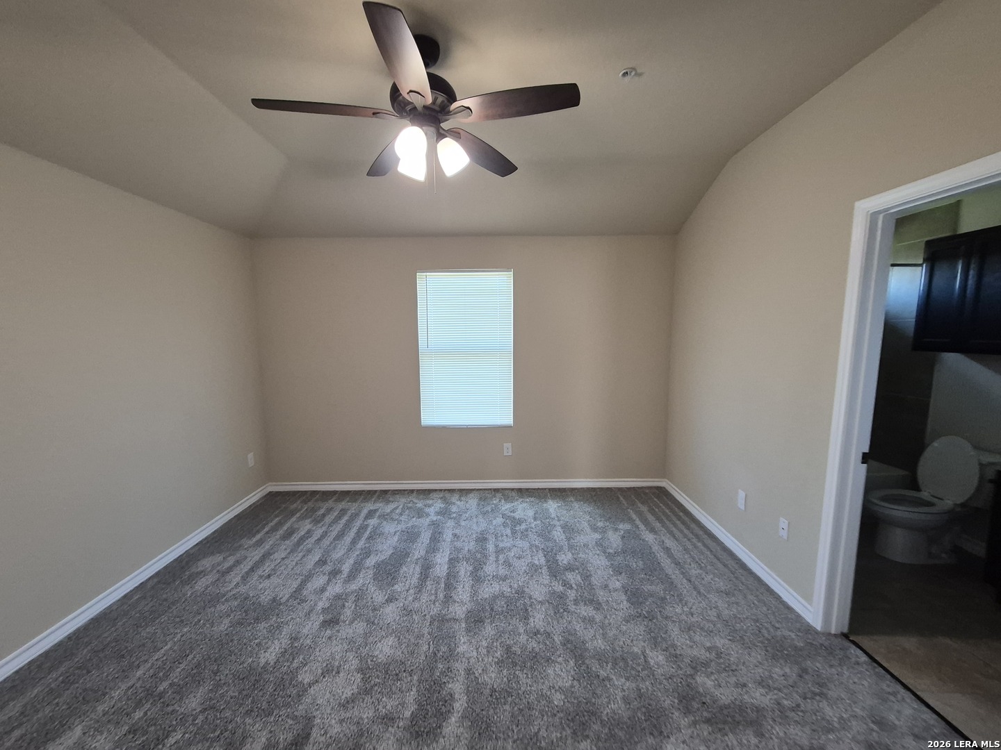 6515 Marcel Way, Unit 101 San Antonio, TX 78233 - Photo 11 of 28 an empty room with a window