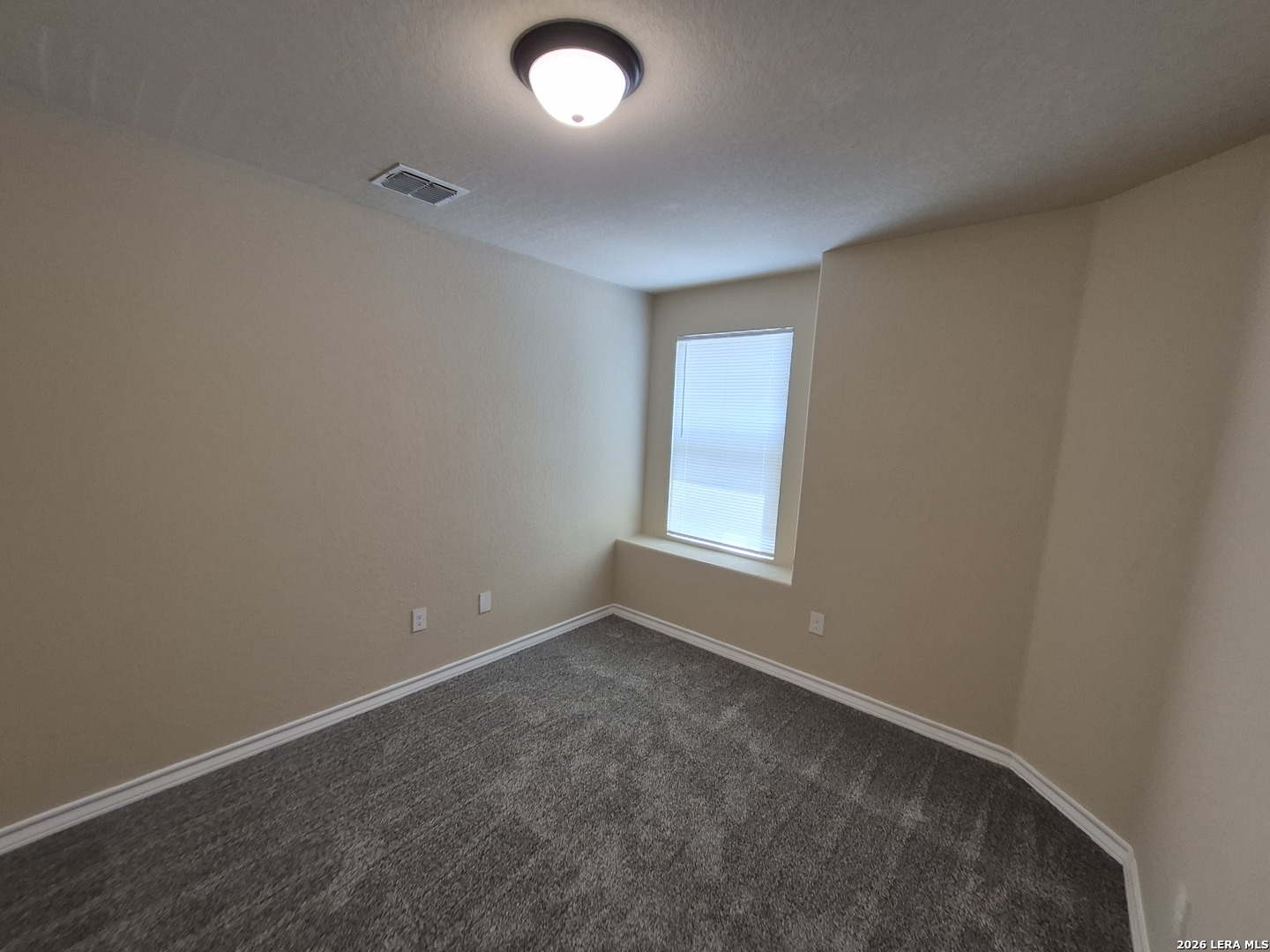 6515 Marcel Way, Unit 101 San Antonio, TX 78233 - Photo 21 of 28 an empty room with a window