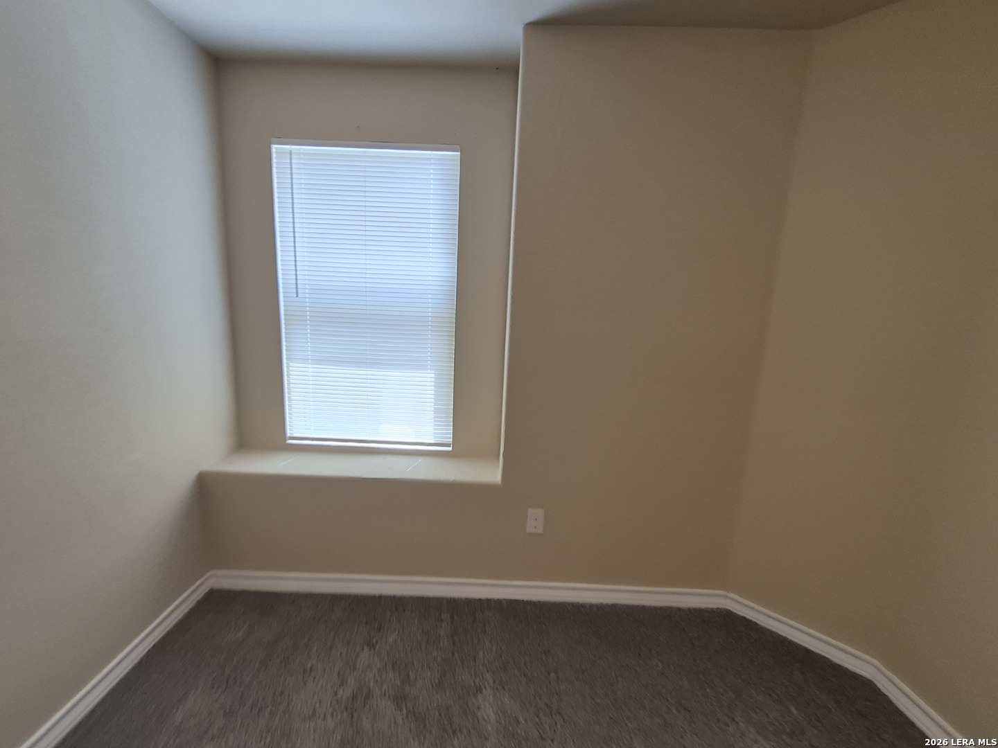 6515 Marcel Way, Unit 101 San Antonio, TX 78233 - Photo 22 of 28 an empty room with a window