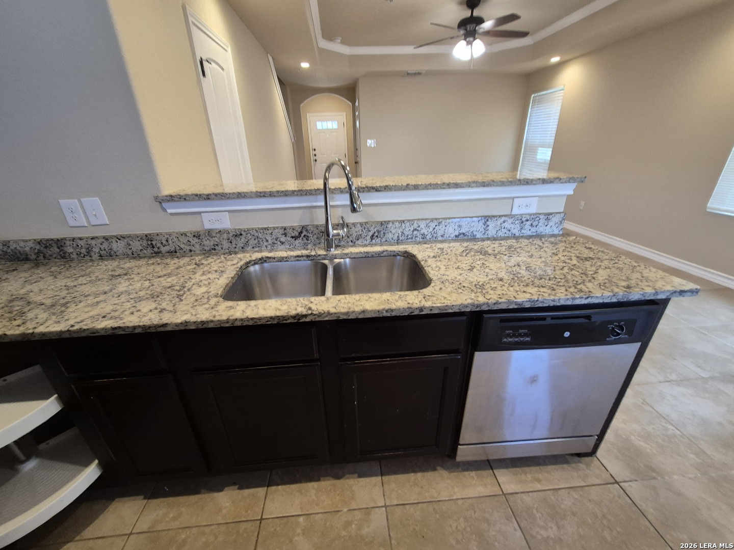 6515 Marcel Way, Unit 101 San Antonio, TX 78233 - Photo 6 of 28 a bathroom with a sink vanity and mirror