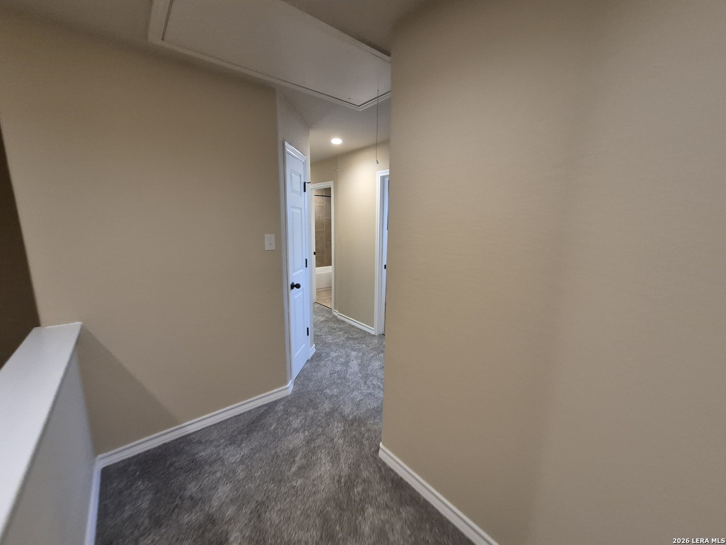 6515 Marcel Way, Unit 101 San Antonio, TX 78233 - Photo 10 of 28 a view of a hallway with an empty room