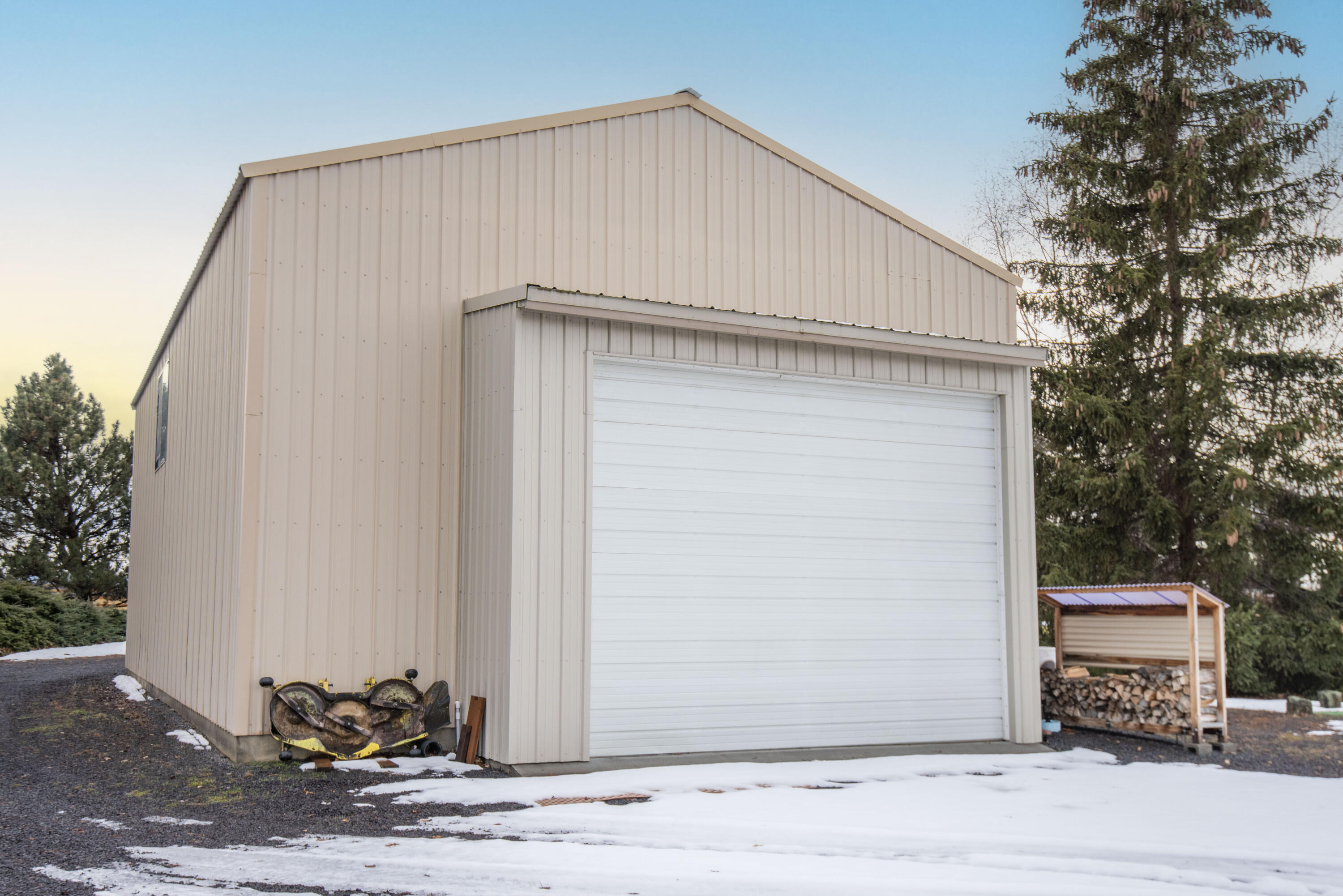 22252 Nelson Road Bend, OR 97701 - Photo 16 of 21 a white house with a outdoor space