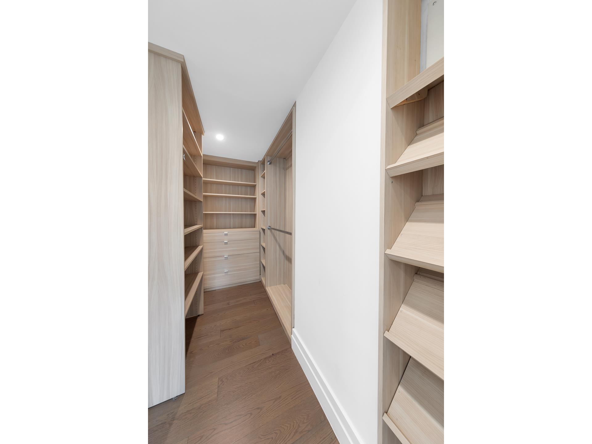 400 East 54th Street, Unit 25A Manhattan, NY 10022 - Photo 9 of 20 a view of hallway with stairs and a room