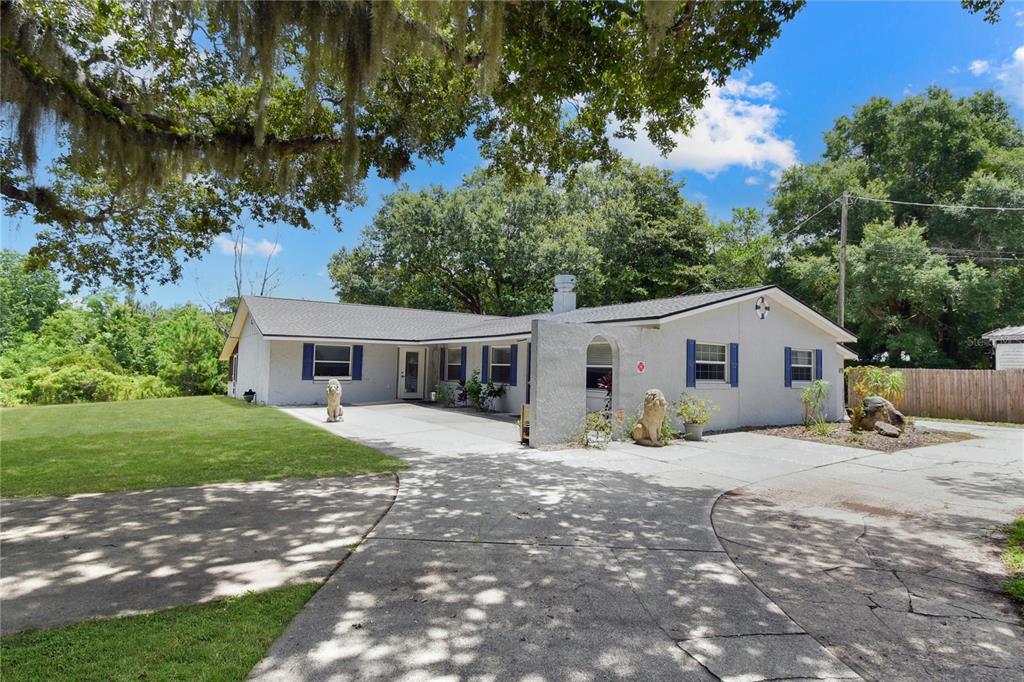 2706 Old Moultrie Road St. Augustine, FL 32086 - Photo 16 of 18 a view of a house with a yard