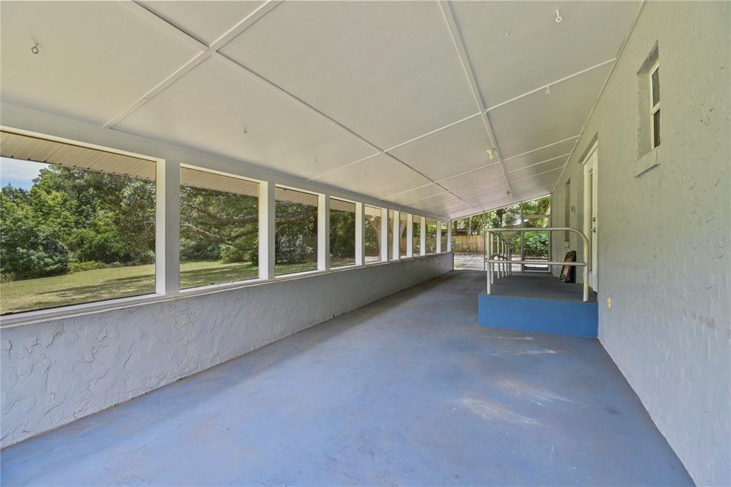2706 Old Moultrie Road St. Augustine, FL 32086 - Photo 10 of 18 a view of a room with furniture and windows