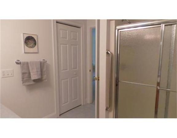 94 Mechanic Street, Unit D Foxboro, MA 02035 - Photo 23 of 30 a bathroom with a shower and a sink