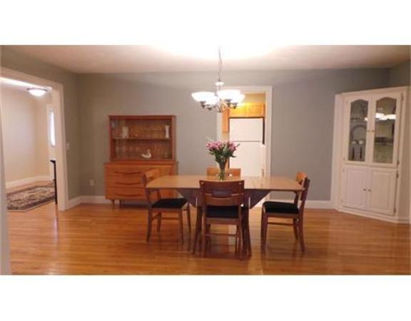94 Mechanic Street, Unit D Foxboro, MA 02035 - Photo 3 of 30 a living room with furniture wooden floor and dining table