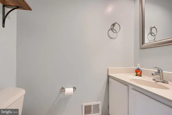a bathroom with a sink and a toilet