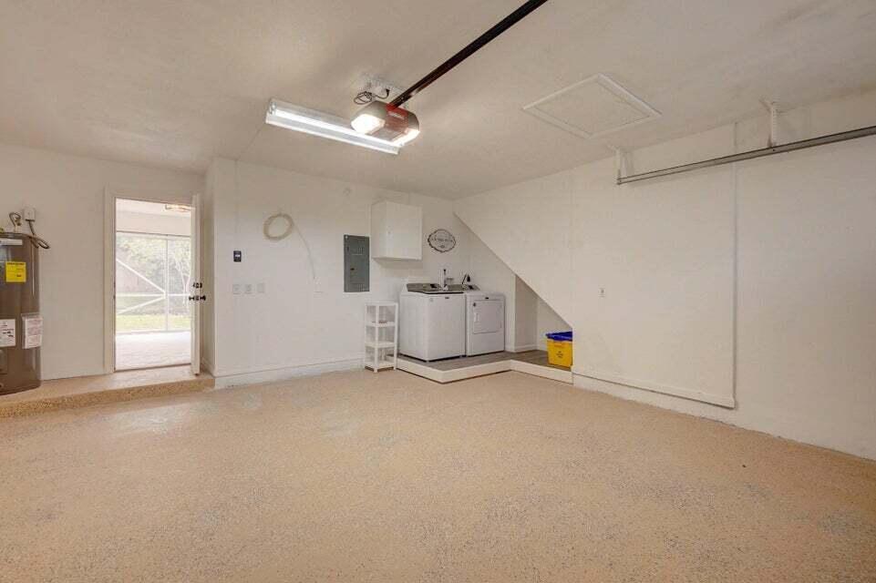 10758 Lake Jasmine Drive Boca Raton, FL 33498 - Photo 31 of 34 an empty room with windows and closet