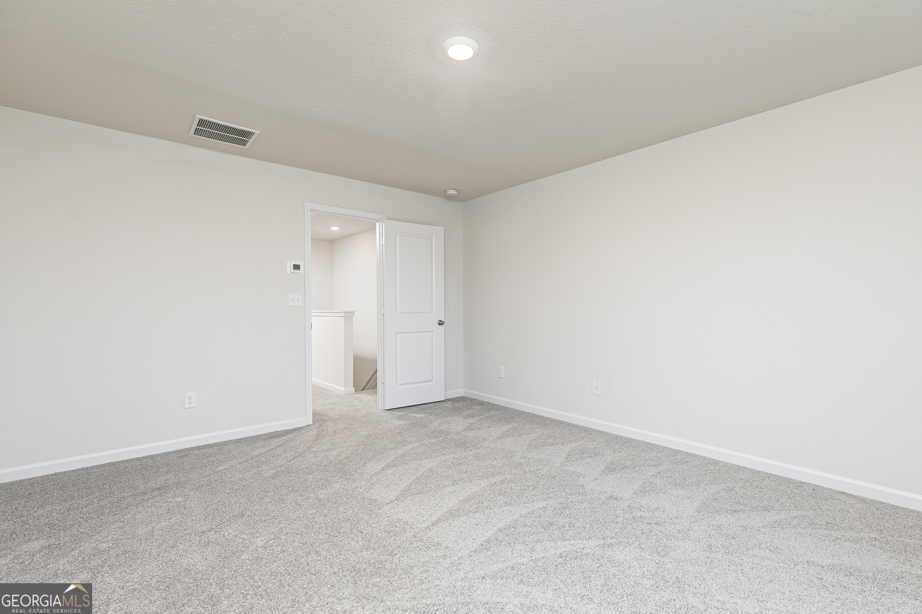 628 Slate Road Conyers, GA 30013 - Photo 17 of 25 a view of an empty room