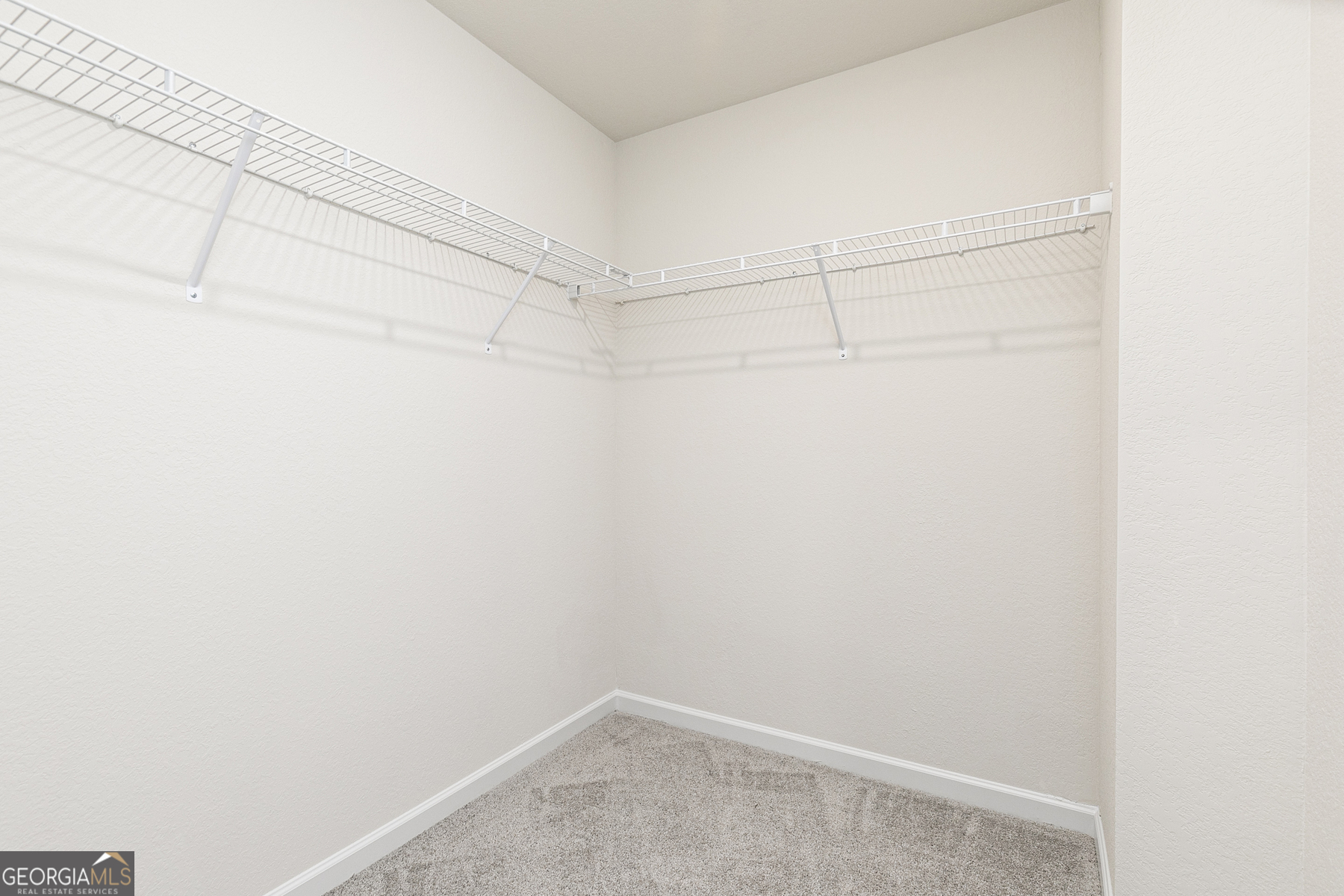 628 Slate Road Conyers, GA 30013 - Photo 21 of 25 a room that has a fan in it